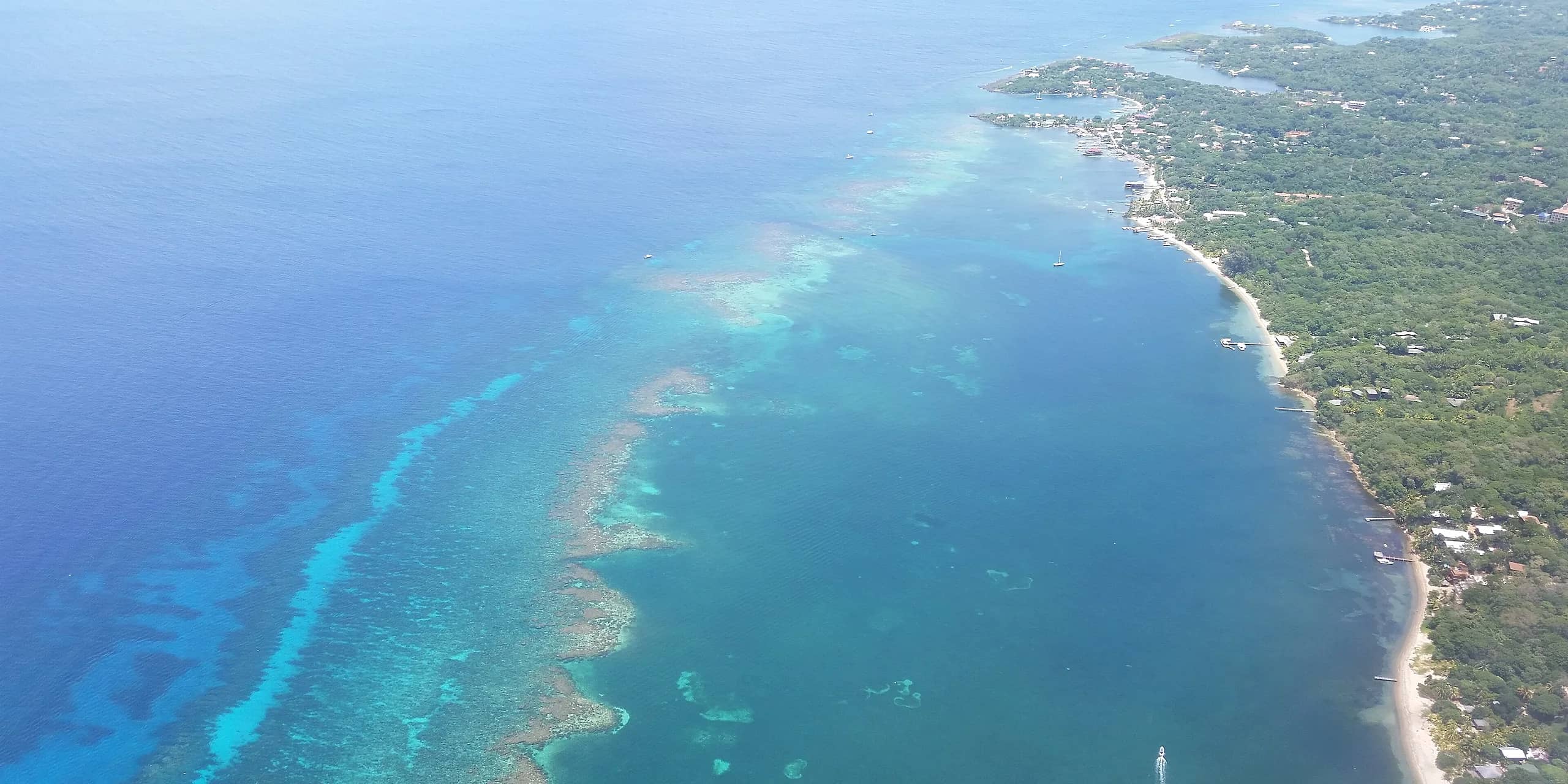 Aerial view of the coast and reef of Roatán, Bay Islands, Honduras